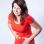 A Woman having stomach pain