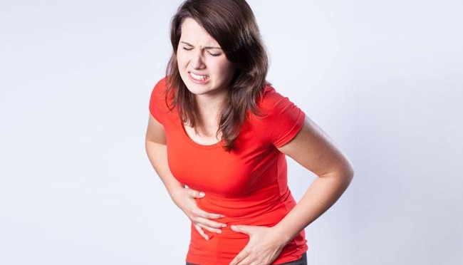 A Woman having stomach pain